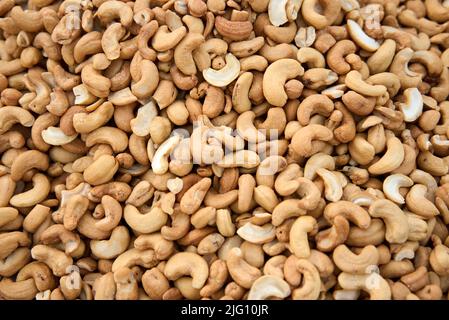 Tasty cashew nuts as background, top view Stock Photo