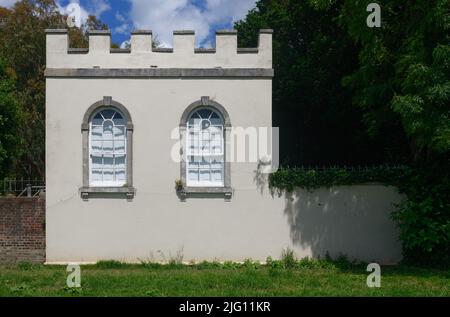 Arched windows and white wall of an outlying building at Asgill House, Richmond-upon-Thames, by the River Thames, England. Stock Photo