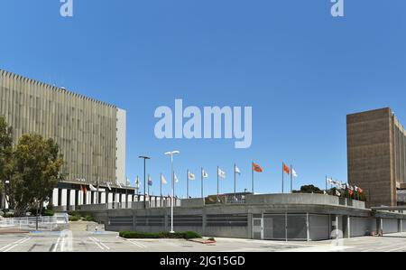 SANTA ANA, CALIFORNIA - 4 JUL 2022: Flag Plaza with the Orange County Courthouse and Santa Ana City Hall. Stock Photo