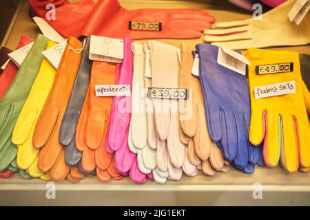 Leather Gloves on sale in Shop Window in Bologna Italy Stock Photo