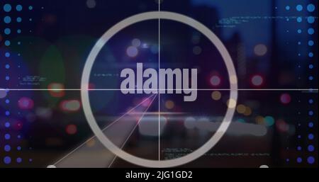 Image of blurred traffic lights over processing circle and dark space Stock Photo