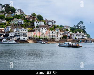 Twin Dartmouth to Kingswear tug guided Lower ferries coming to meet at Kingswear slip Stock Photo