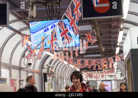 Waterloo railway station decorated with union jacks during Platinum jubilee celebration England UK Stock Photo