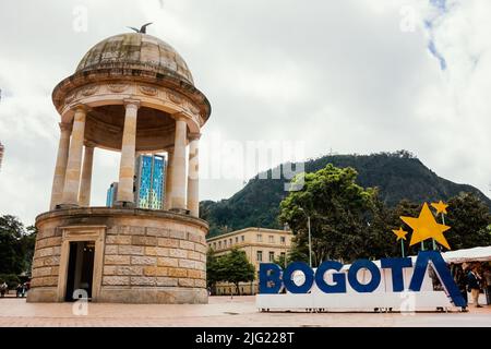 Parque De los Periodistas next to the institutional logo of the Bogotá mayor's office, in the background the hill of Monserrate, Bogotá 06 July 2022 Stock Photo