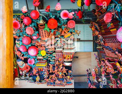 Yak butter sculptures include all kinds of Buddha figures, portraits, flowers, trees, and pavilions made of a mixture of white yak butter mineral dye. Stock Photo