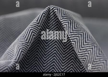 Stylish black and grey herringbone fabric texture background Stock Photo