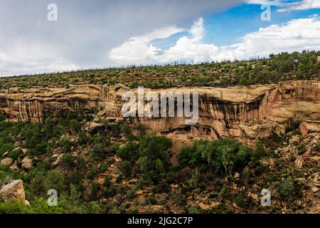 Cliff dwellings come in many shapes and sizes . Stock Photo