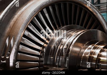 A powerful steam turbine rotor is installed in the lodgment of the steam turbine base. Stock Photo