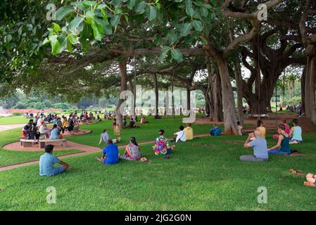 Auroville, India - 2nd July 2022: 500 aurovilians walked to the Banyan tree in response to the threat Auroville is currently facing and to support the Stock Photo