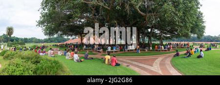 Auroville, India - 2nd July 2022: 500 aurovilians walked to the Banyan tree in response to the threat Auroville is currently facing and to support the Stock Photo