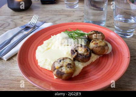 Fried mushrooms with mashed potato Stock Photo