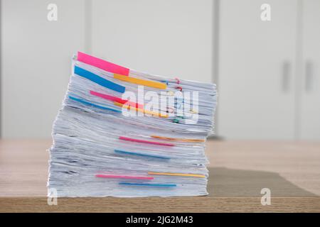 Stack of business paper Businessman working reading documents graph financial to job succes Analyze document plans documents on office desk Stock Photo