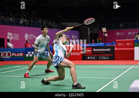 Kuala Lumpur, Malaysia. 7th July, 2022. Malaysia's Chan Peng Soon/Cheah Yee See(R) compete during the mixed doubles round of 16 match against China's Zheng Siwei/Huang Yaqiong at Malaysia Masters 2022 in Kuala Lumpur, Malaysia, July 7, 2022. Credit: Chong Voon Chung/Xinhua/Alamy Live News Stock Photo