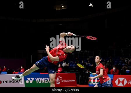 Kuala Lumpur, Malaysia. 7th July, 2022. China's Zheng Siwei(L)/Huang Yaqiong compete during the mixed doubles round of 16 match against Malaysia's Chan Peng Soon/Cheah Yee See at Malaysia Masters 2022 in Kuala Lumpur, Malaysia, July 7, 2022. Credit: Chong Voon Chung/Xinhua/Alamy Live News Stock Photo