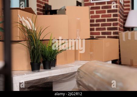 Empty rented apartment prepared to relocate household and move in together, starting new beginnings after buying first property. Moving day with domestic life event, real estate loan. Stock Photo
