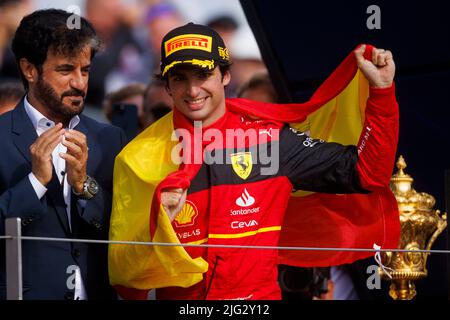 Carlos Sainz celebrates winning his first ever F1 Grand Prix on the podium at the F1 British Grand Prix. Carlos Sainz wins his first F1 race at the Br Stock Photo