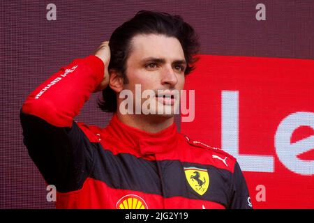 Carlos Sainz celebrates winning his first ever F1 Grand Prix on the podium at the F1 British Grand Prix. Carlos Sainz wins his first F1 race at the Br Stock Photo