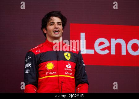 Carlos Sainz celebrates winning his first ever F1 Grand Prix on the podium at the F1 British Grand Prix. Carlos Sainz wins his first F1 race at the Br Stock Photo