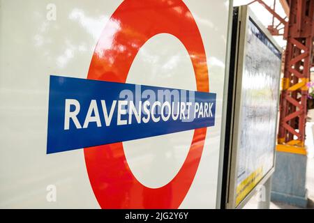 London- June 2022: Ravenscourt Park underground station sign Hammersmith, West London Stock Photo