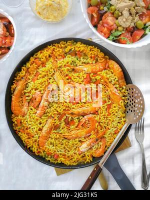 Cooking paella typical from Valencia Spain recipe with rice Stock Photo ...