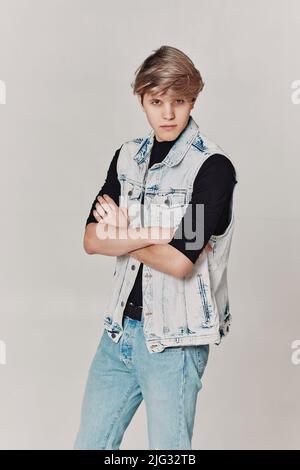 young handsome guy with modern haircut in denim Stock Photo
