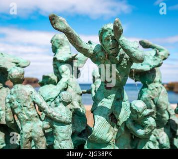Fishing disaster memorial statue of miniature figures of widows