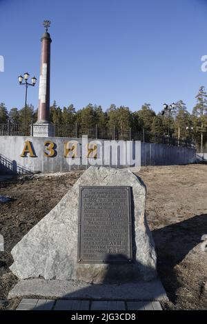 Monumental obelisk on the border between Europe and Asia in a forest near Ekaterinburg, Russia Stock Photo