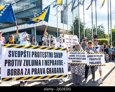 About 2,000 citizens protested today in front of the BiH parliament building due to price increases during the recession. Stock Photo