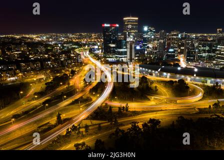 Aerial long exposure of Perth city at night including the freeway traffic Stock Photo