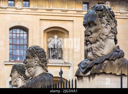 busts of classical philosophers, Emperor Heads, at the Sheldonian Theatre, Oxford at Oxford, Oxfordshire UK on a wet rainy day in August Stock Photo