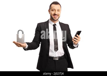 Businessman holding a padlock and a smartphone isolated on white background Stock Photo
