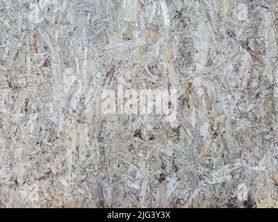 Old dirty Compressed natural bagasse texture use for background. Textured and background of bagasse plywood or bagasse particle board (Plain) for use Stock Photo