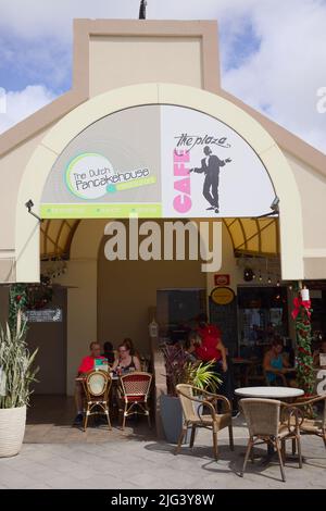 ORANJESTAD, ARUBA - DECEMBER 4, 2021:  The Dutch Pancakehouse and The Plaza Cafe restaurants in the Renaissance Marketplace shopping mall on Aruba Stock Photo