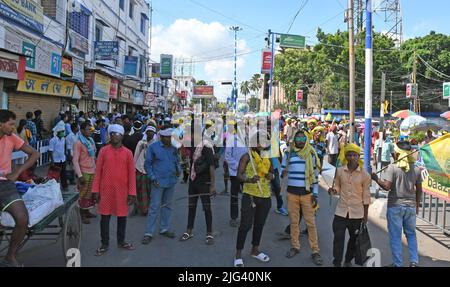 Burdwan, Purba Bardhaman, West Bengal / India - July 07, 2022: Indigenous people blocked roads in Burdwan with traditional weapons in multiple demands Stock Photo