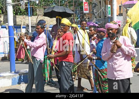 Burdwan, Purba Bardhaman, West Bengal / India - July 07, 2022: Indigenous people blocked roads in Burdwan with traditional weapons in multiple demands Stock Photo