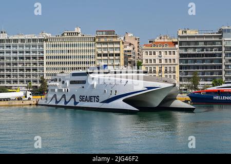 Athens, Greece - May 2022: Twin hull high speed ferry Champion Jet moored in the port of Piraeus after arriving from one of the Greek Islands. Stock Photo