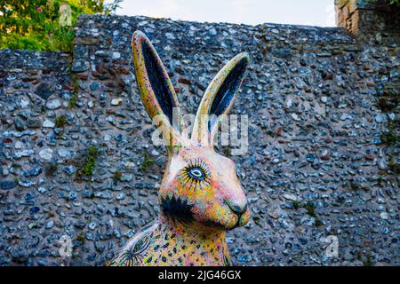 'Hartley Hare', a sculpture by Jacky Purtill in the Hares of Hampshire public art trail event by the Bishop's Palace, College Street, Winchester Stock Photo