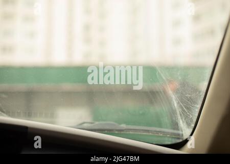 Window in car. Dirty glass in transport. View from interior of car. Stock Photo