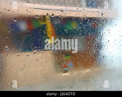 Water drops on the glass,Concept of driving in rain, bad driving conditions, selective focus. Stock Photo