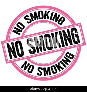 NO SMOKING text written on pink-black round stamp sign Stock Photo