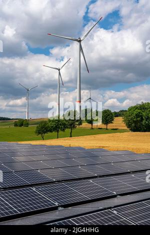 Wind farm near Lichtenau, East Westphalia-Lippe, a 100 kW solar power system was installed on the crane installation area in front of a wind turbine, Stock Photo