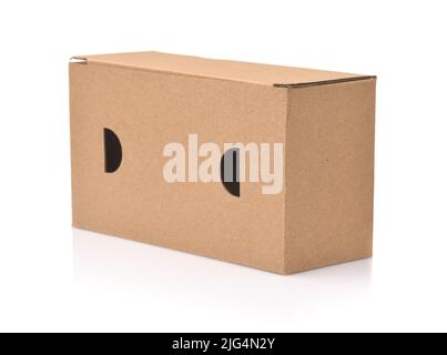 Brown kraft corrugated paper box with holes isolated on white Stock Photo