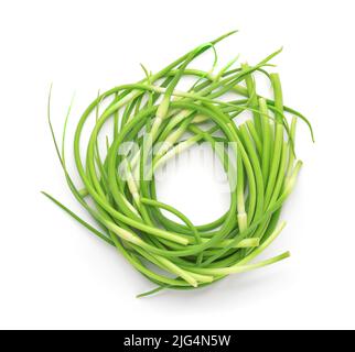 Top view of fresh young garlic scapes isolated on white Stock Photo