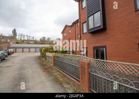 CREDITON, DEVON, UK - APRIL 6, 2022 housing project and garages on Market Street Stock Photo