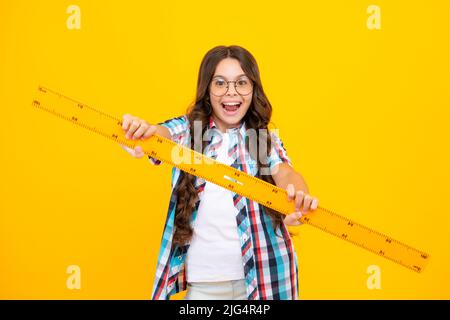 School teenager child girl measuring with compass divider. Geometry ...