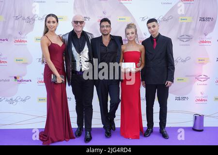 (left to right) Emily Andre, John Caudwell, Peter Andre, Princess Andre, and Junior Andre arriving for the annual charity Butterfly Ball at The Londoner Hotel in Leicester Square, central London. Picture date: Thursday July 7, 2022. Stock Photo