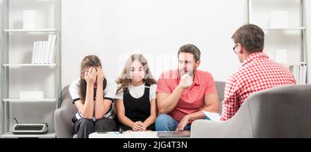 Psychologist with young couple, psychotherapist or marriage counselor listen mental health of couple and child, Parents problem, family therapy Stock Photo