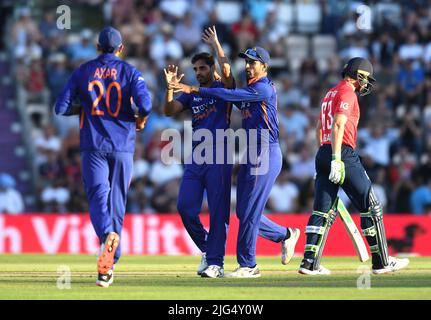 India's Bhuvneshwar Kumar (centre) celebrates taking the wicket of England's Jos Buttler during the first Vitality IT20 match at The Ageas Bowl, Southampton. Picture date: Thursday July 7, 2022. Stock Photo