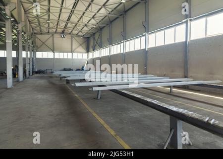 steel construction of the hall roof with insulating panels Stock Photo