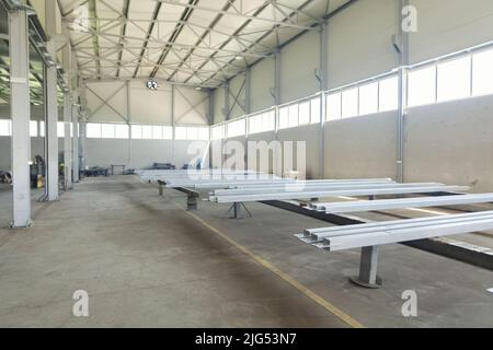 steel construction of the hall roof with insulating panels Stock Photo